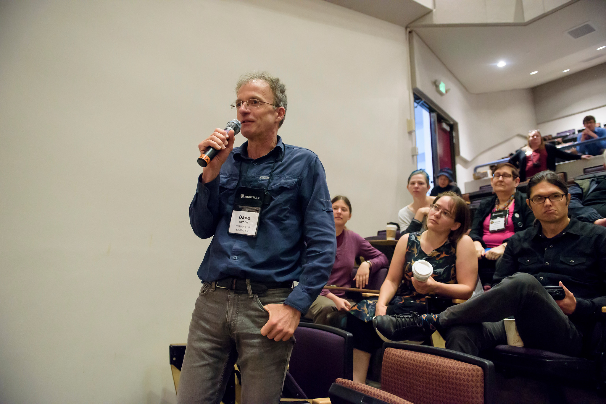 A man speaking at an event.